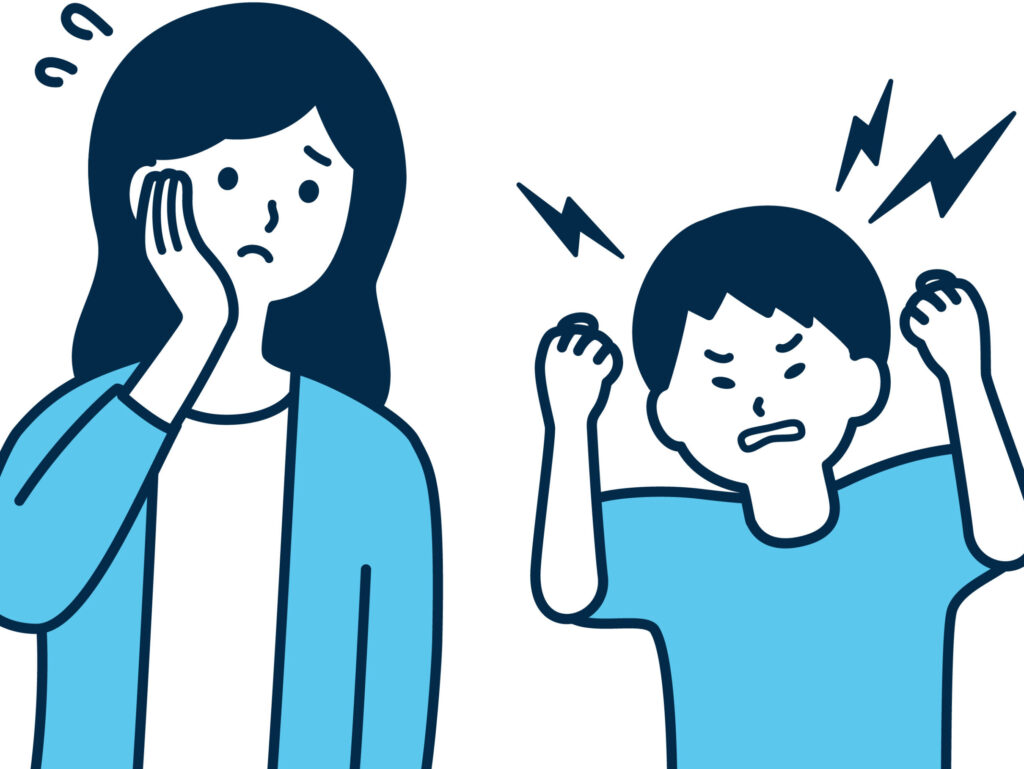 小さな刺激で怒りやすい子どもと対応に困っている大人の「易刺激性をイメージした」イラスト